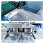 Bag former and middle sealing wheels on horizontal flow wrapping machine