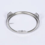 Stainless steel stamped retaining ring with precision formed locking tabs for industrial assemblies