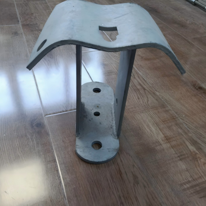 Front view of transformer mounting bracket showing bolt holes and flat mounting plate