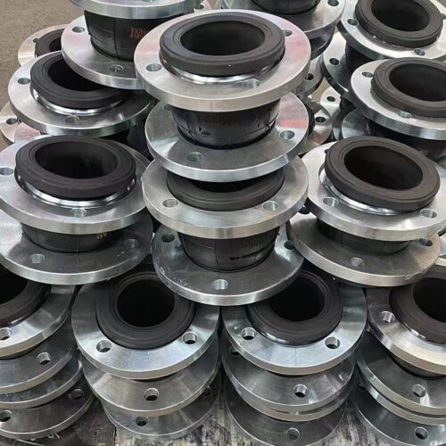 . Flange‑mounted rubber bellows compensator for piping system